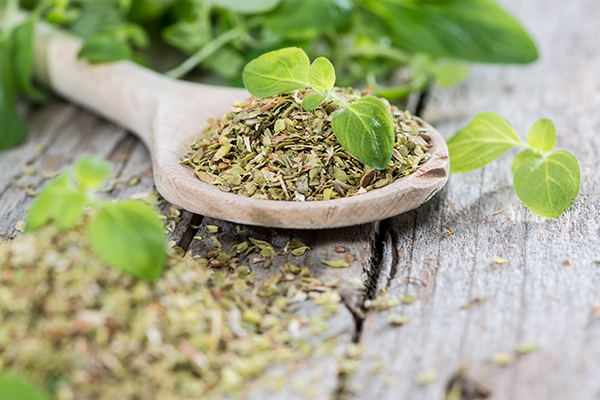 Wooden Spoon with shredded Oregano