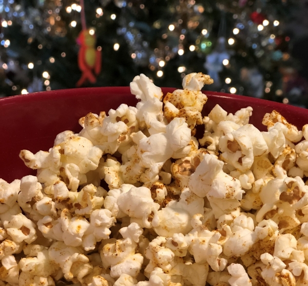 Savory Cajun-Spiced Popcorn Savory Cajun-Spiced Popcorn in front of a Christmas Tree