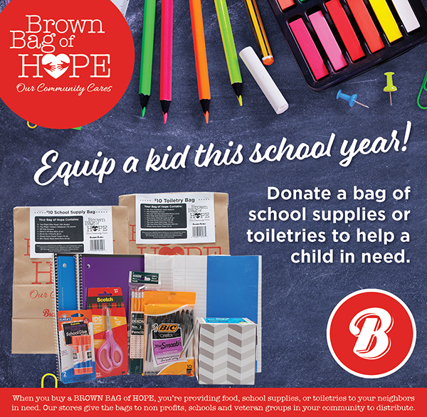 Back to School themed Brown Bags of Hope are pictured on a school-themed background with pencils and school supplies scattered over chalk board.