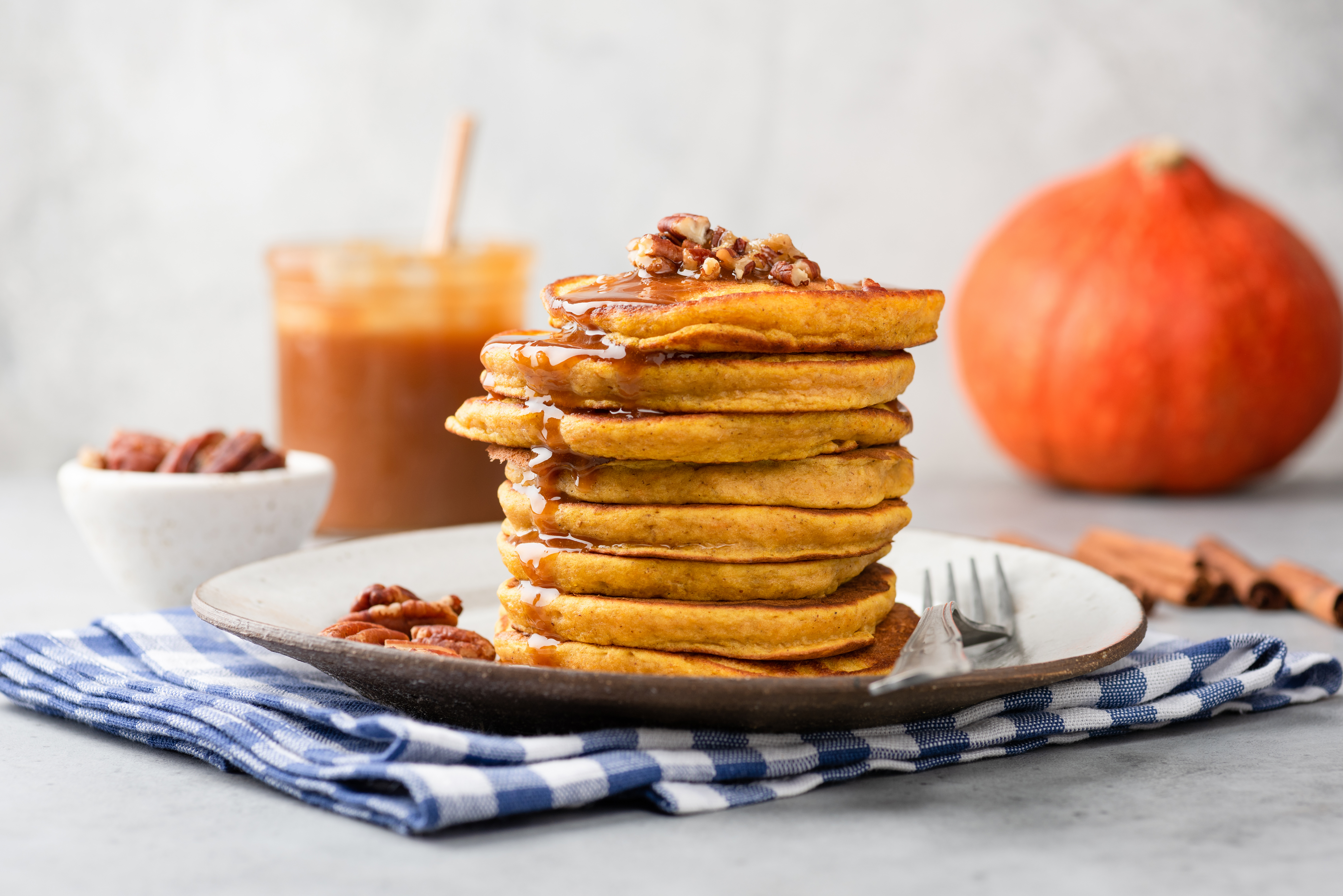 Pumpkin Spice Pancakes with Cinnamon Pecan Maple Syrup
