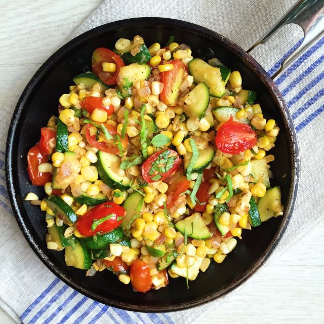 A skillet of various vegetables that have been sautéed 